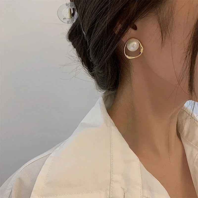 Her Pearl Earrings